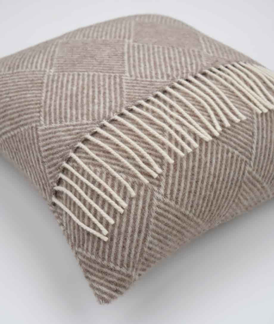 pure new wool cosy cushion with fringes