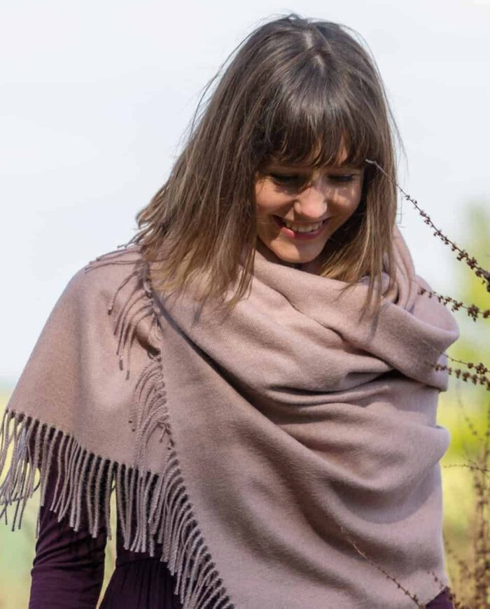 lifestyle picture with baby alpaca wool shawl wrap so cosy collection