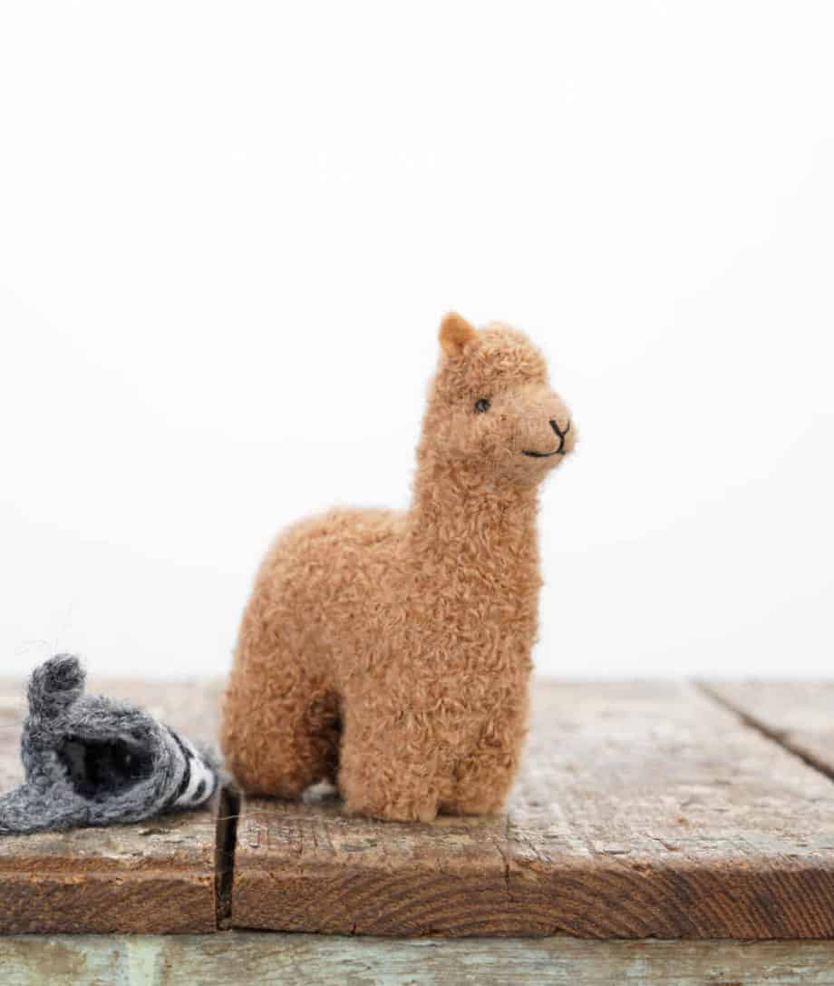needle felted baby alpaca soft toy with grey hat