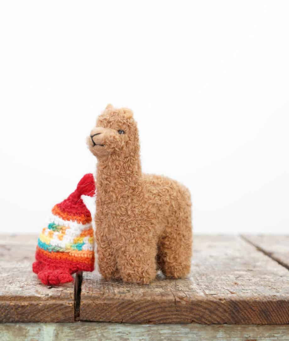 super cute needle felted baby alpaca soft toy with red hat