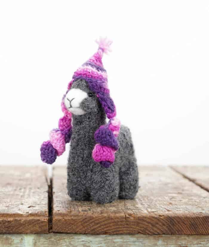 cosy handmade grey alpaca with purple hat