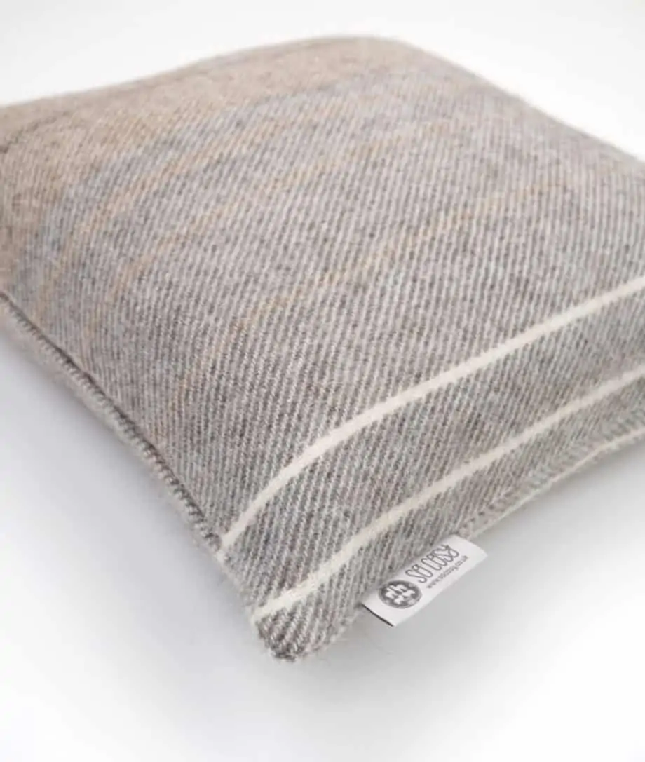 deluxe cosy cushion made from pure undyed wool in grey brown cream shades