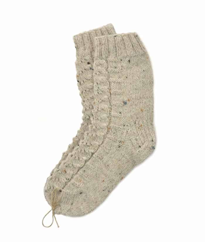 Hand knitted socks in stone melange merino wool