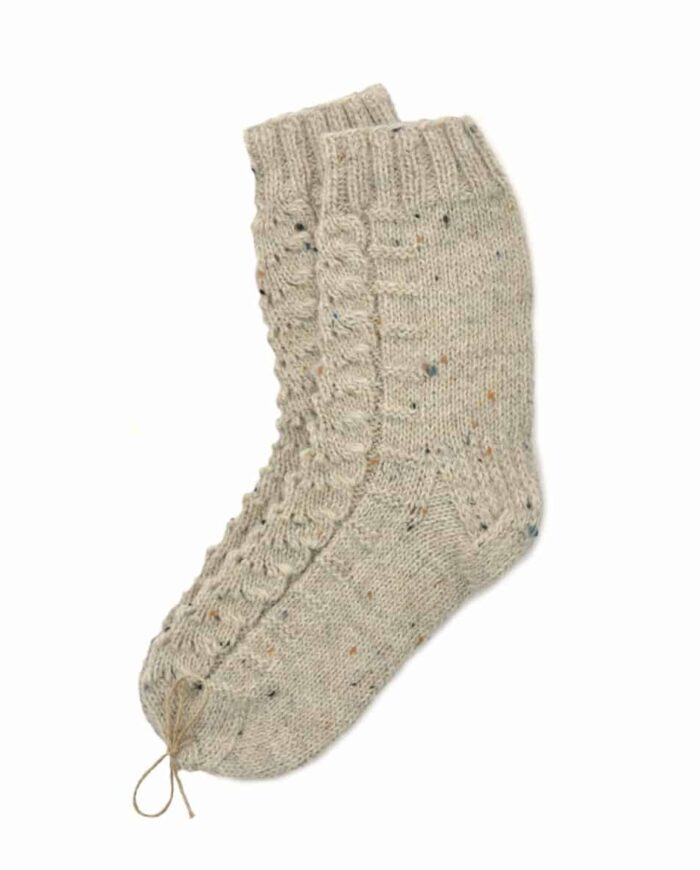 Hand knitted socks in stone melange merino wool