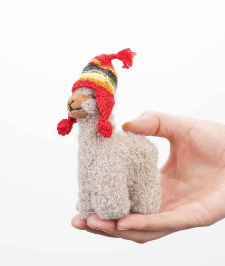 cute baby alpaca soft toy with a red colour hat