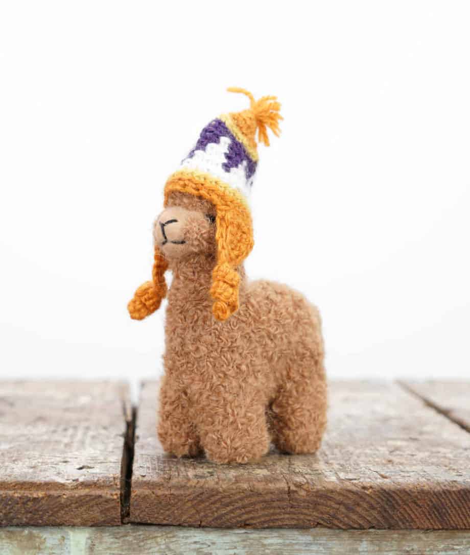 brown baby alpaca soft toy with ochre brown hat
