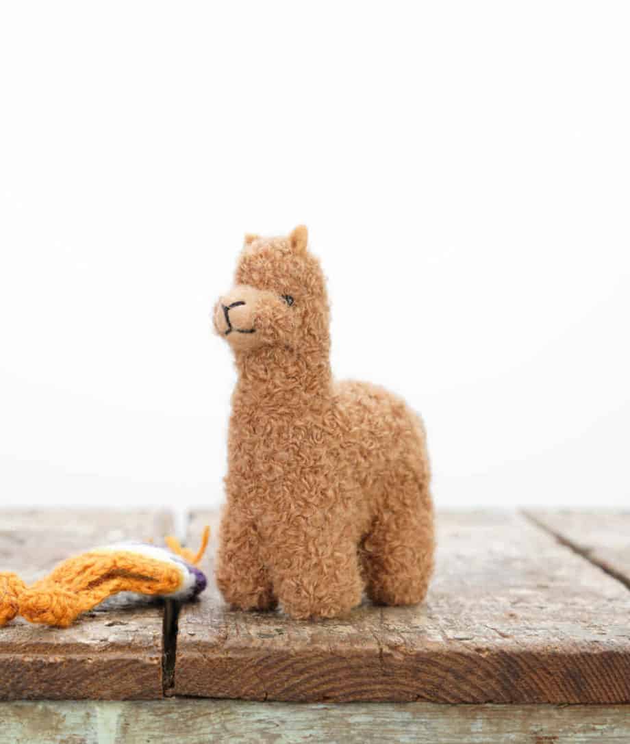 super cute handmade baby alpaca soft toy with ochre brown hat