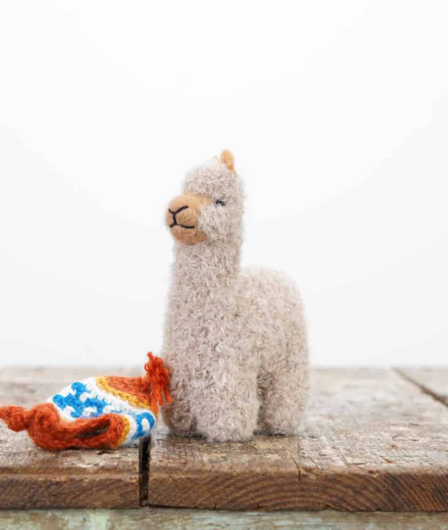 handmade baby alpaca soft toy with orange hat