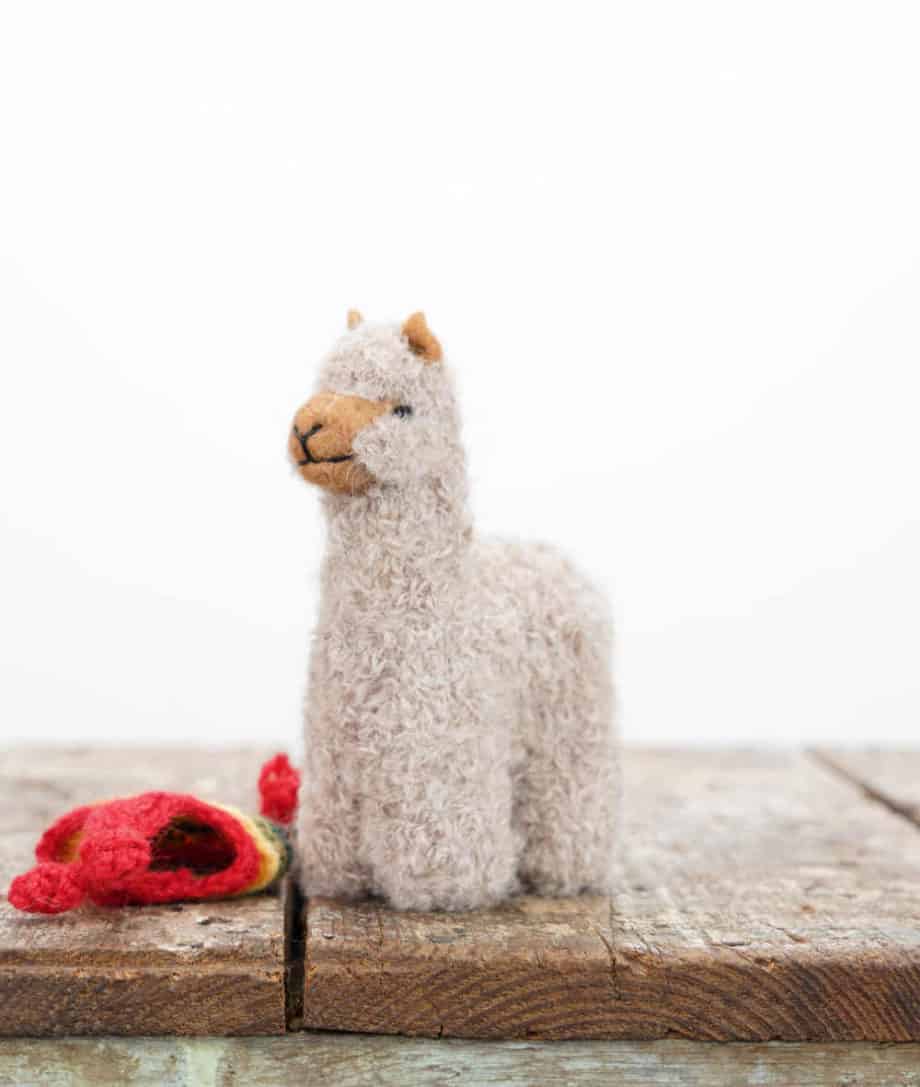 handmade baby alpaca soft toy with a red colour hat