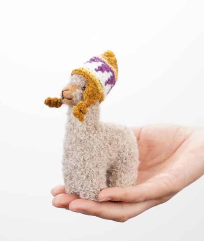 super cute handmade baby alpaca toy with a hat