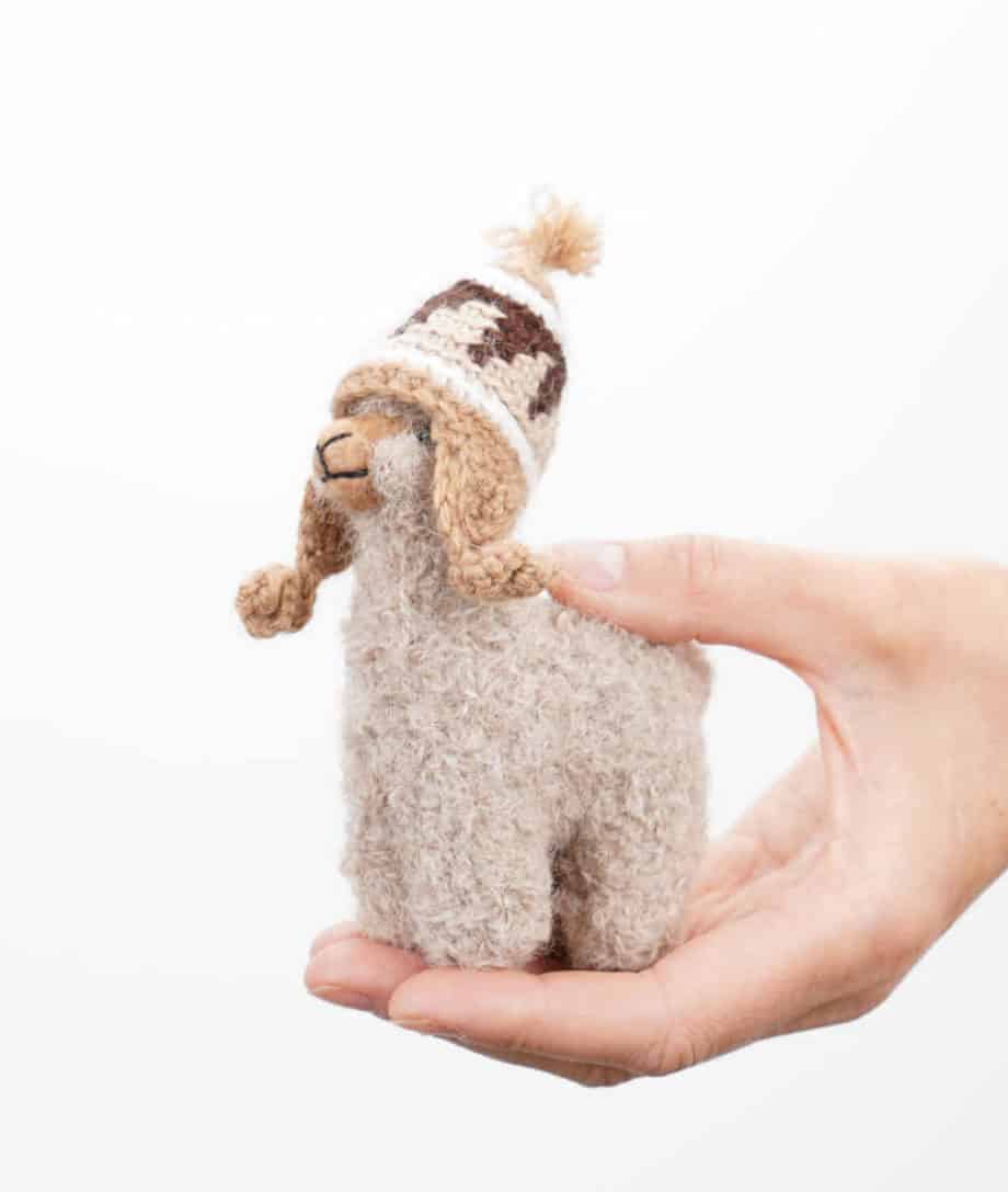 cute handmade baby alpaca soft toy with a brown hat