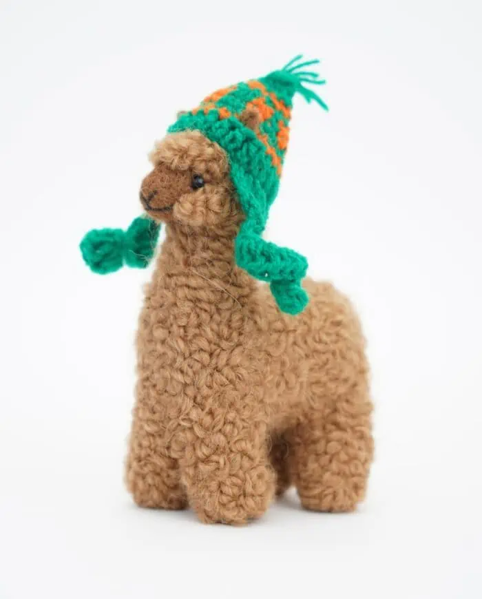 cute handmade brown baby alpaca soft toy with green hat