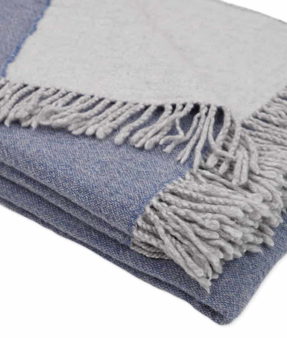 cosy merino wool throw in denim grey colour