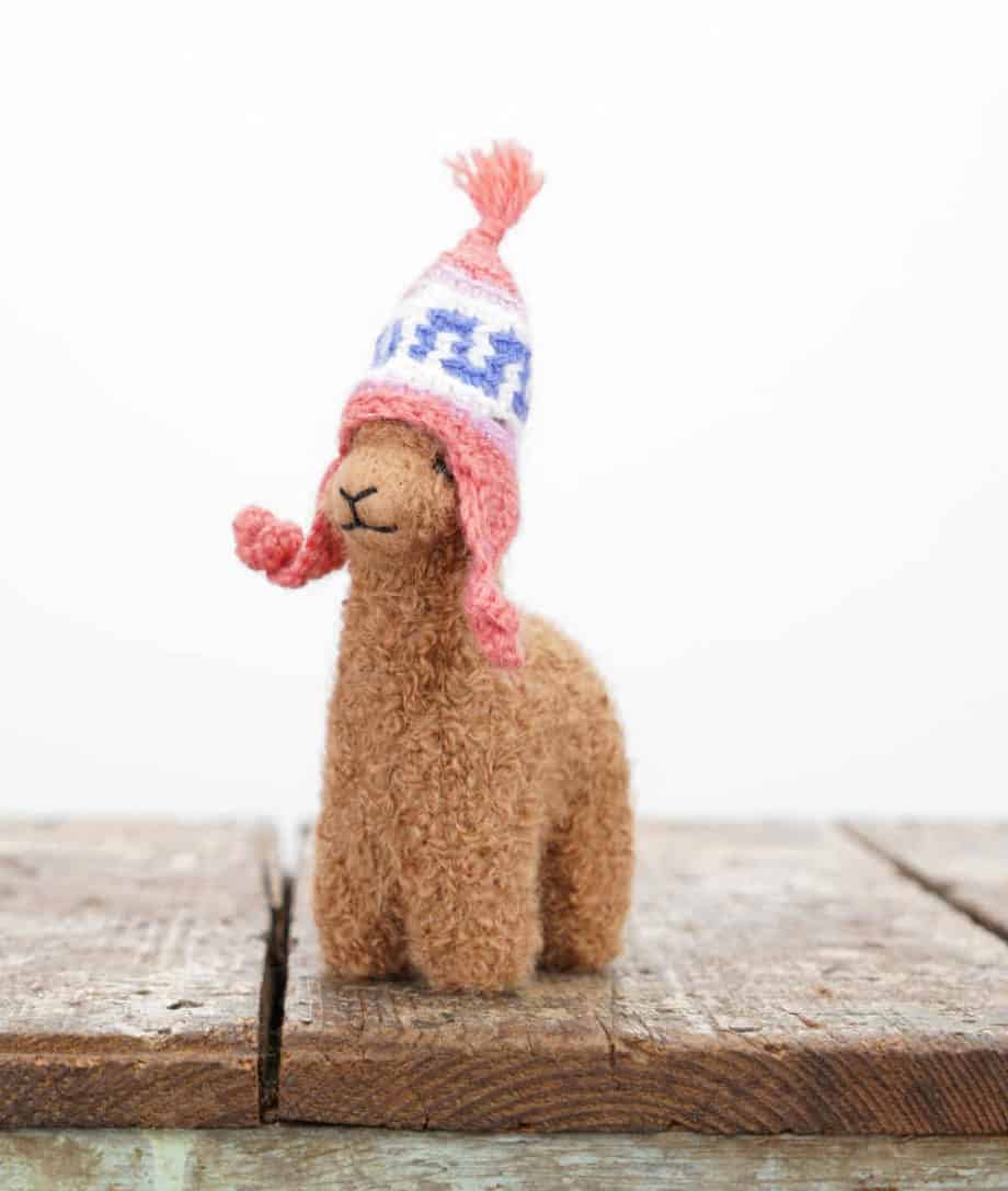 cute and cosy baby alpaca soft toy with pink hat