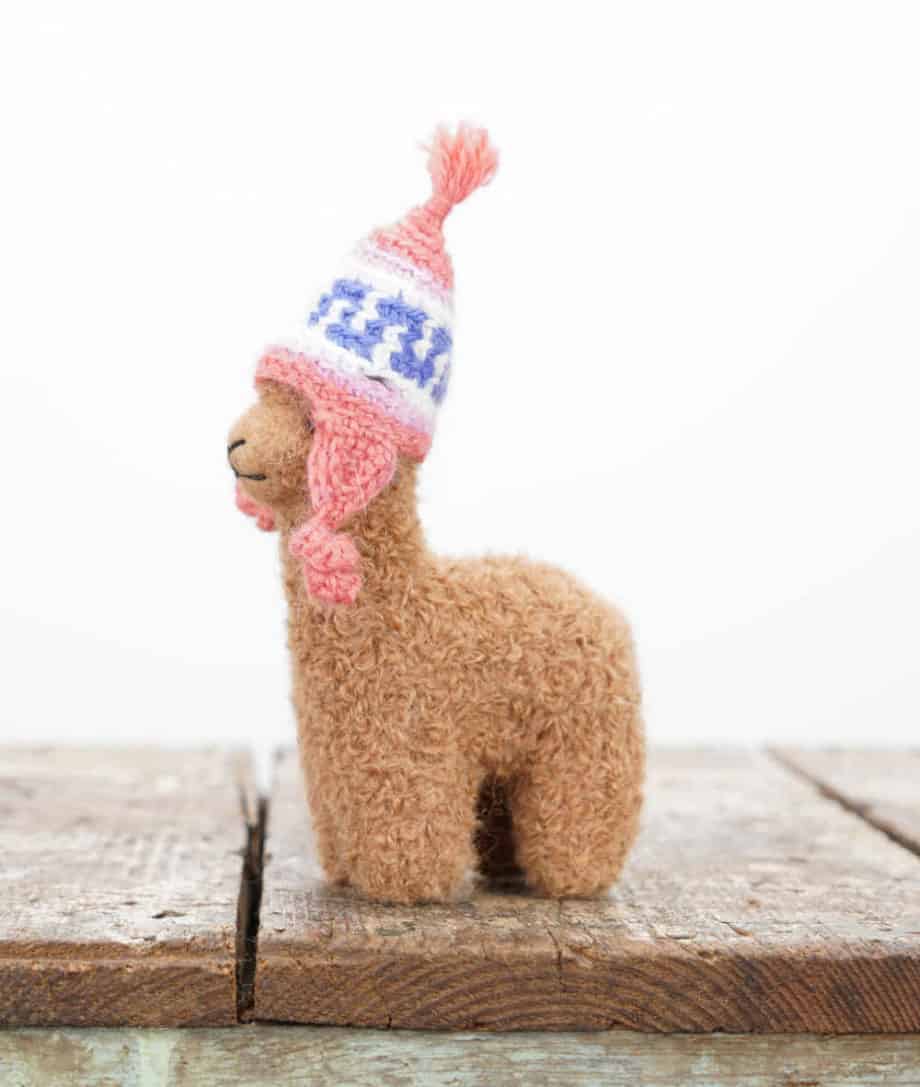 hand felted baby alpaca soft toy with pink hat