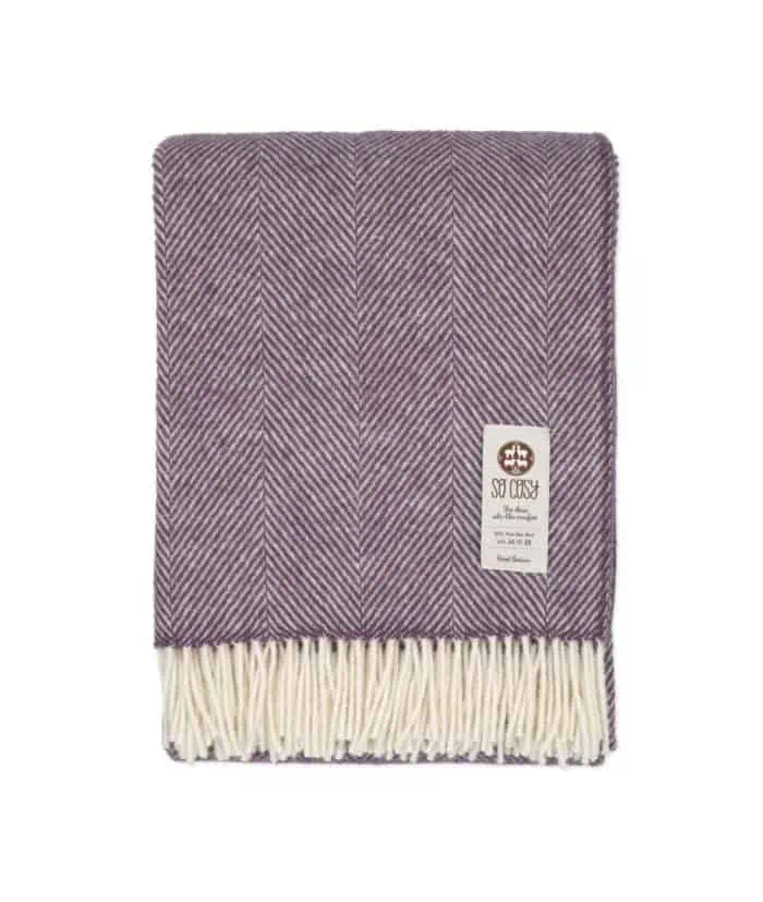 cosy pure wool herringbone throw blanket in purple and white