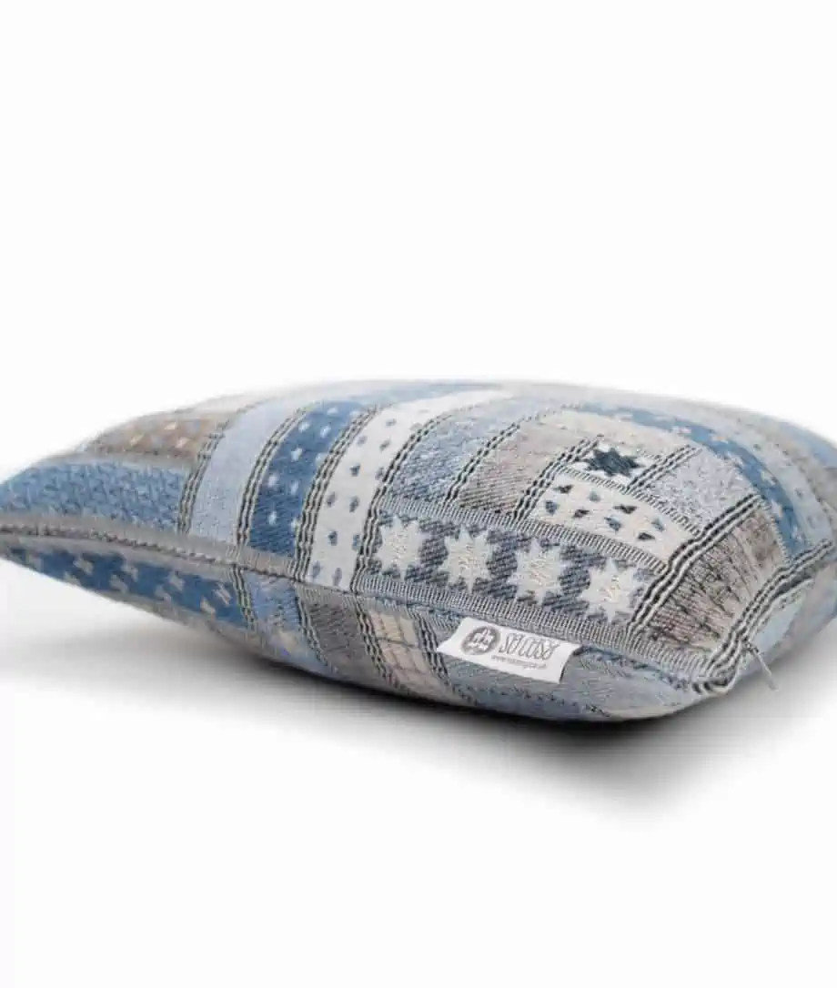 muted blue log cabin pattern cosy merino wool cushion