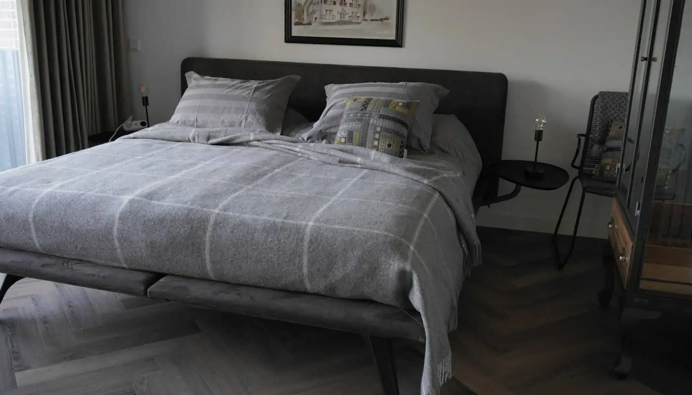 Bergen check design large cosy bedspread in grey colour