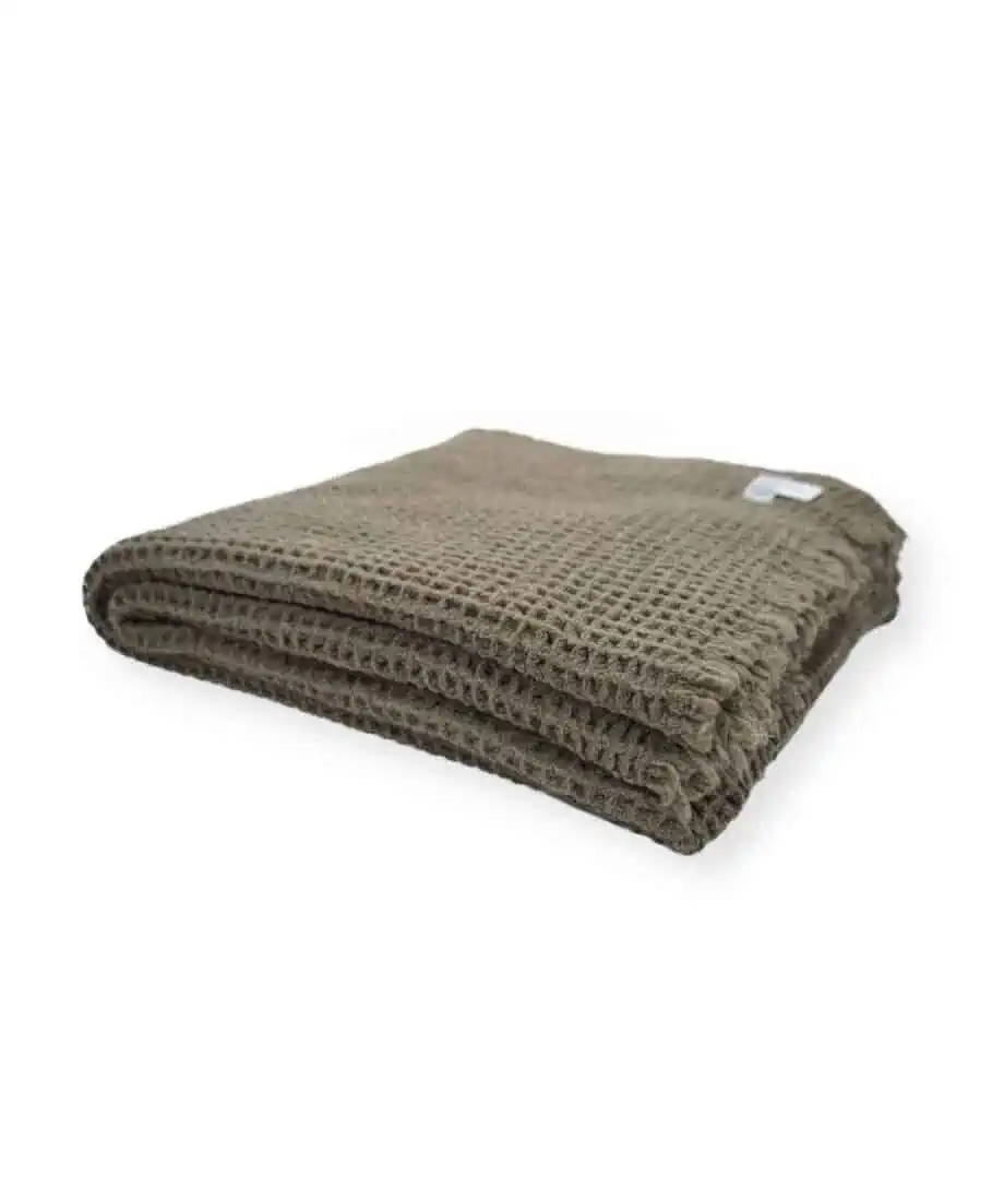 so cosy merino wool throw blanket in covert green colour