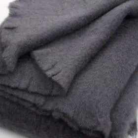 warm soft fluffy mohair wool cosy throw blanket in flokstone grey colour