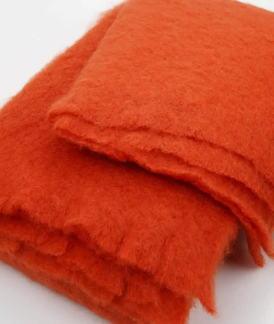 Deep orange colour mohair wool cosy blanket throw