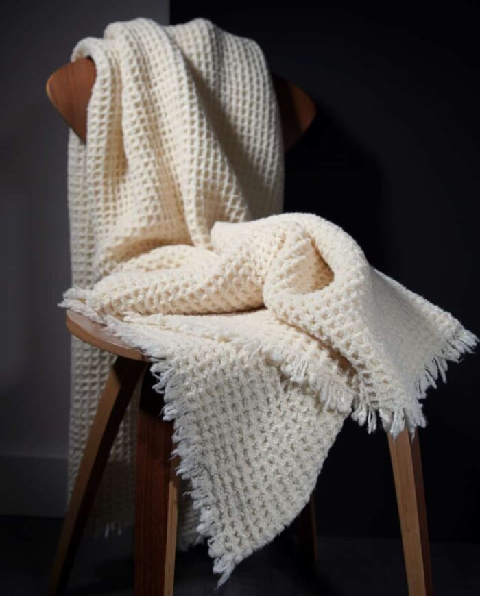 Floki cosy soft merino wool throw blanket in cream white colour