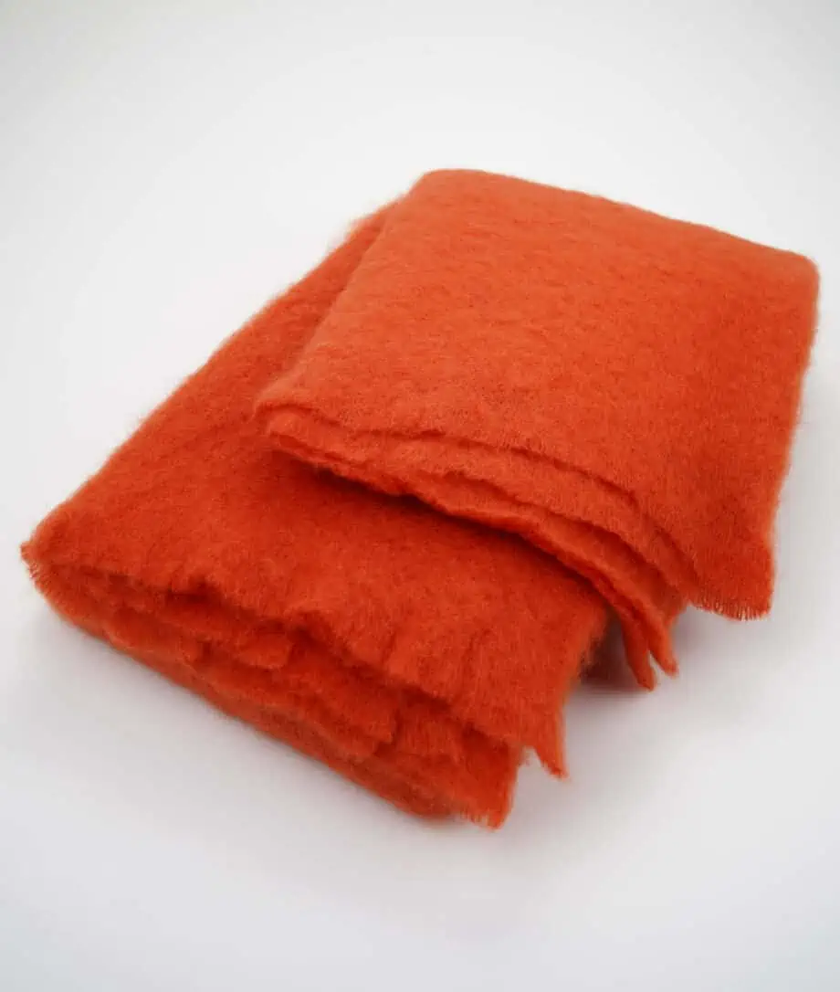Luxury soft cosy Lisos mohair wool blanket throw in deep orange colour