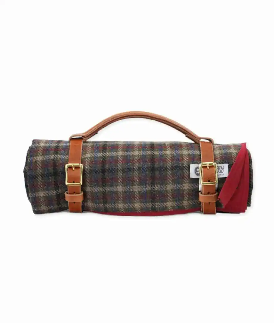 roll up red wax cotton and tartan wool so cosy picnic blanket