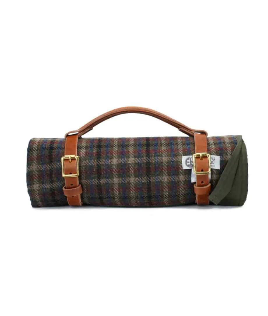 So Cosy's olive green wax cotton and wool picnic blanket, perfect for outdoor adventures