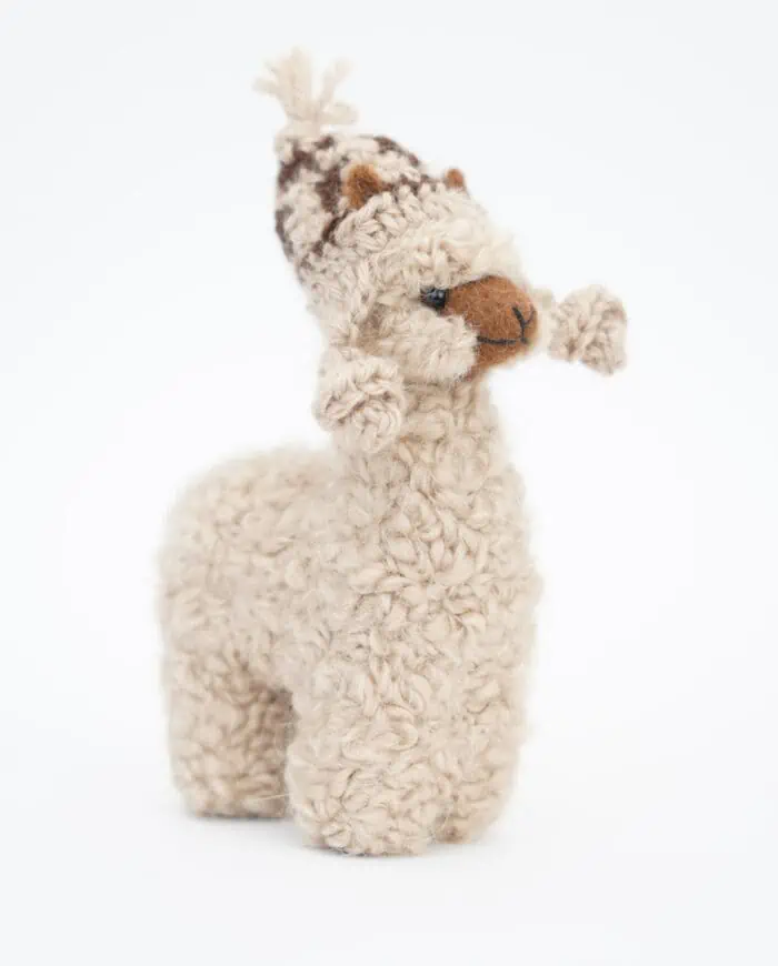 baby alpaca soft toy with a beige hat