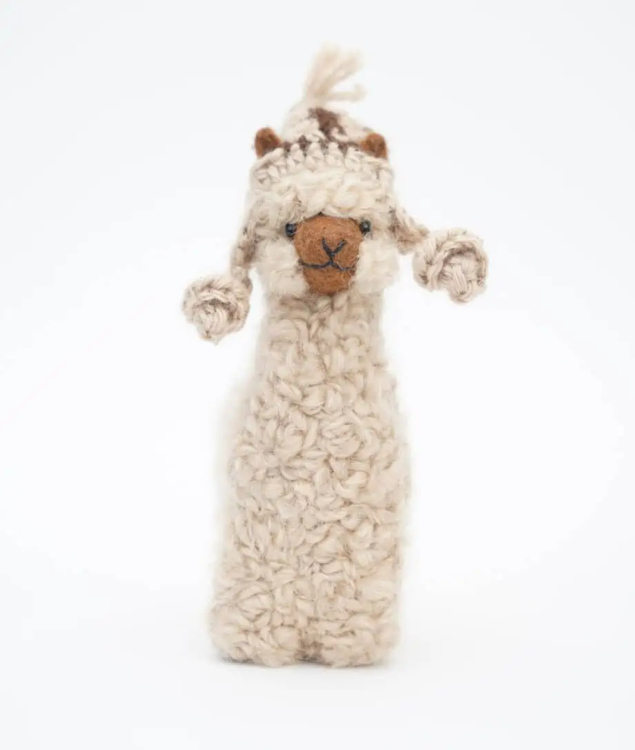 cute hand made baby alpaca soft toy with a beige hat