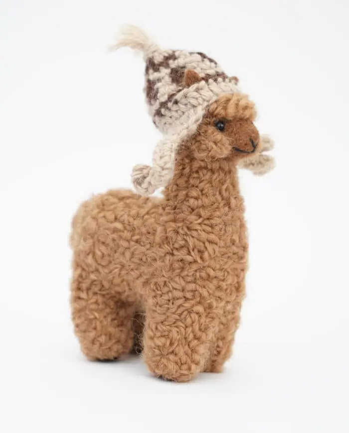 adorable baby alpaca soft toy with a beige hat