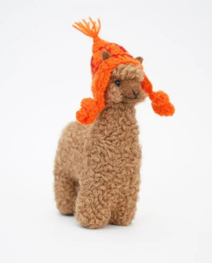 cosy handmade brown baby alpaca soft toy with and orange hat