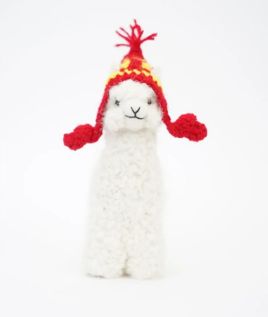 cure baby alpaca soft toy with a red hat