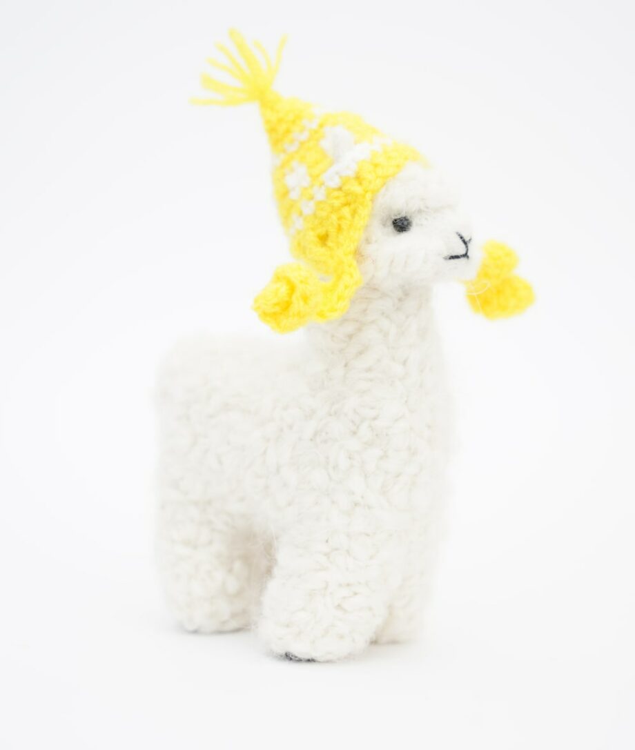 adorable hand made baby alpaca sof toy with hand crochet yellow hat