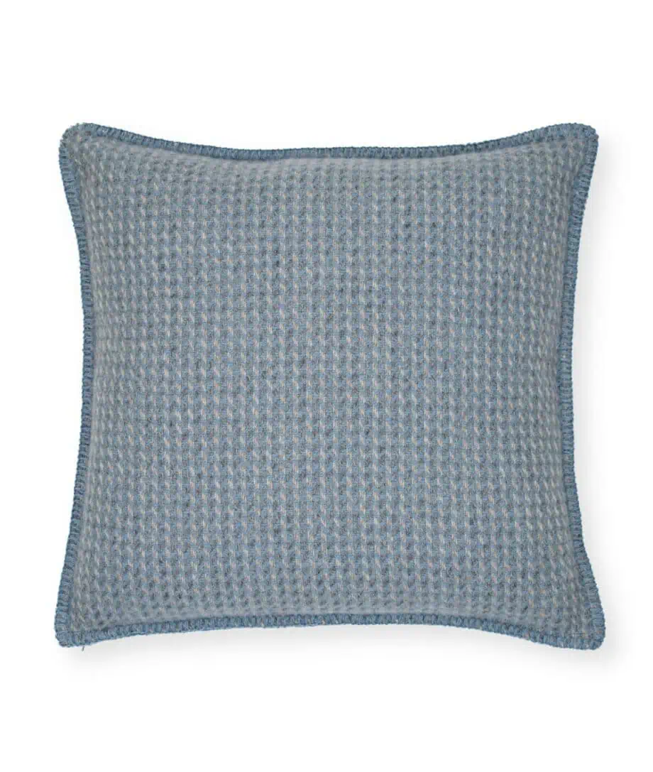 cosy merino wool cushion in blue grey taupe colours