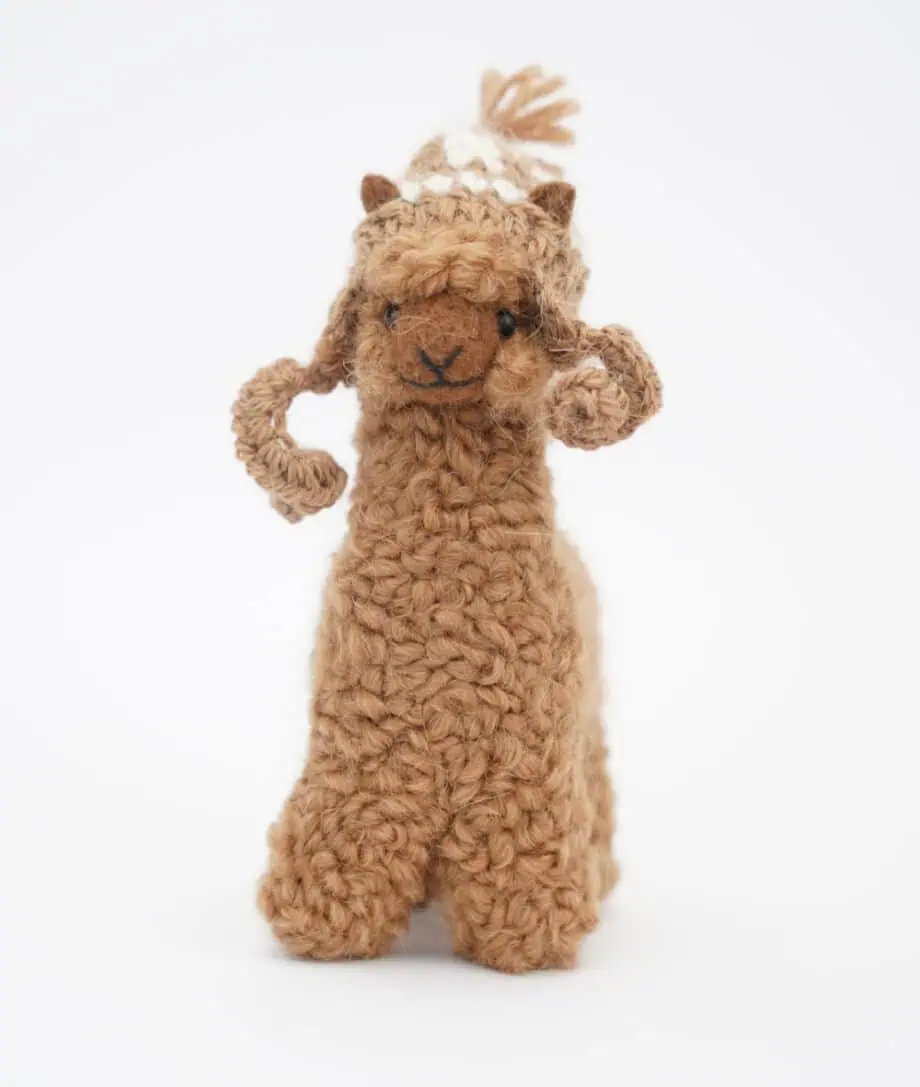 sweet alpaca soft toy with a brown hat