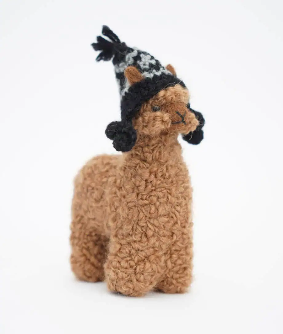 cute brown baby alpaca soft toy with a hat
