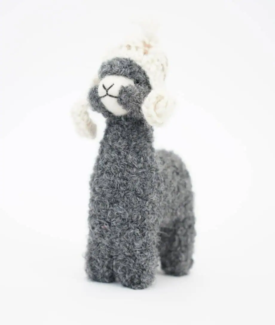 sweek grey alpaca soft toy with a cream hat